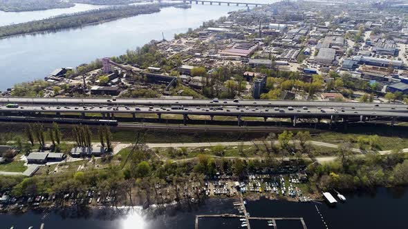 City Traffic on the Bridge in the Industrial Area of the City alt
