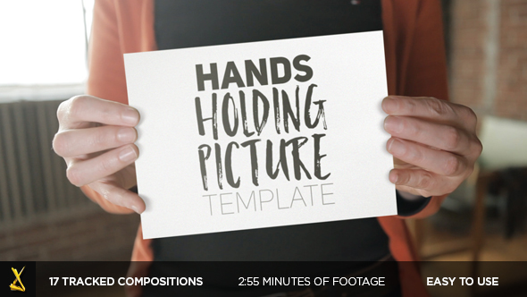 Hands Holding Pictures - VideoHive 13748637