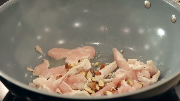 Chef Is Putting Sunflower Seeds And Crushed alt