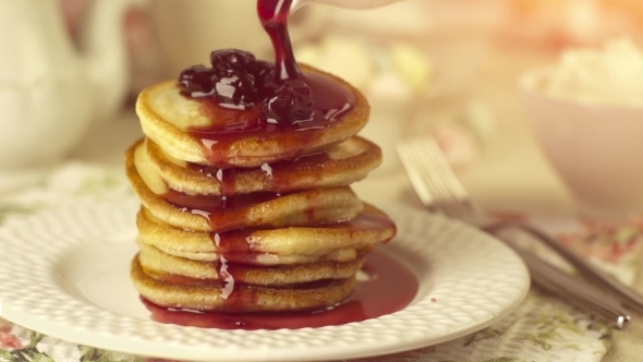 Pancakes With Pouring Cherry Jam