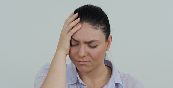 Woman with Bad Headache