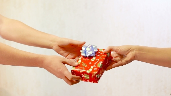 Male Hand Pass The Red Box Gift Box Female Hands