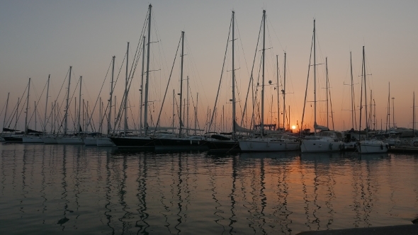 Sailing Boats In Marina At a Sunset 