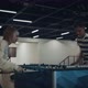 Excited Students Playing Table Football in Empty School Lobby After Classes - VideoHive Item for Sale