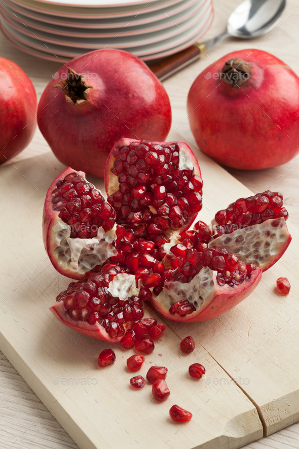 Open pomegranate fruit and seeds Stock Photo by picturepartners | PhotoDune