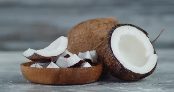 The Pieces of Coconut in the Plate Falling Water Drops. 