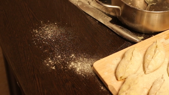 Pours Flour On The Table