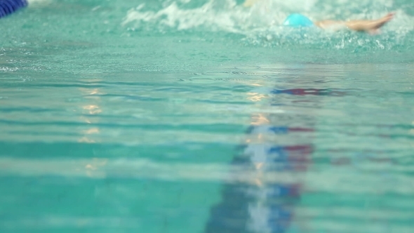 Swimmer Floats In The Pool