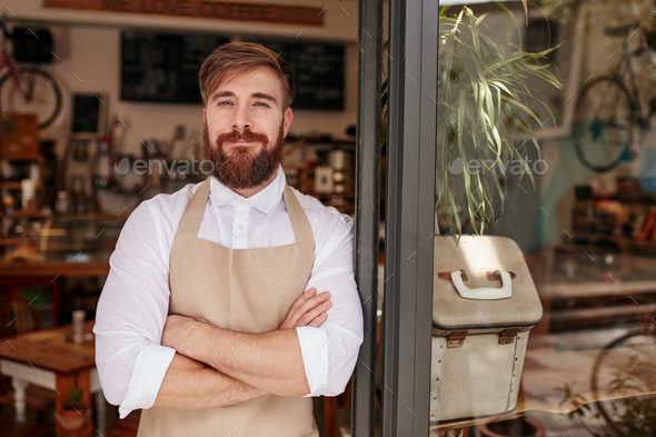 Handsome and confident cafe owner - Stock Photo - Images