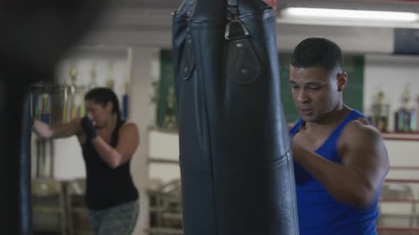 Man working out at boxing gym