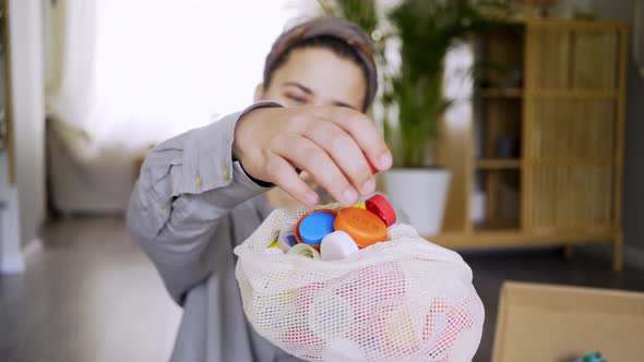 Recycle Volunteer Collects Plastic Cap