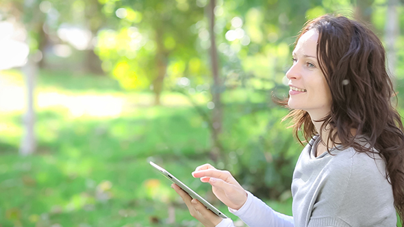 Woman Using Tablet PC