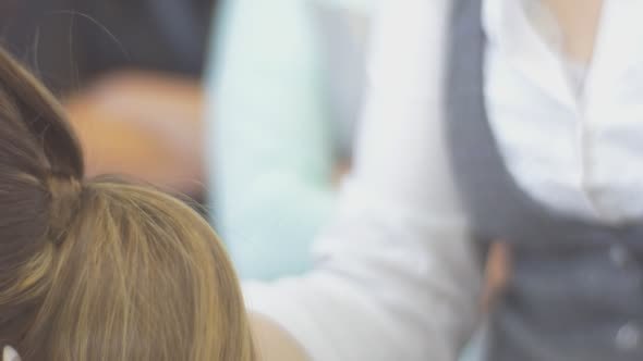 Stylist Hairdresser is Combing Finally Fixing alt