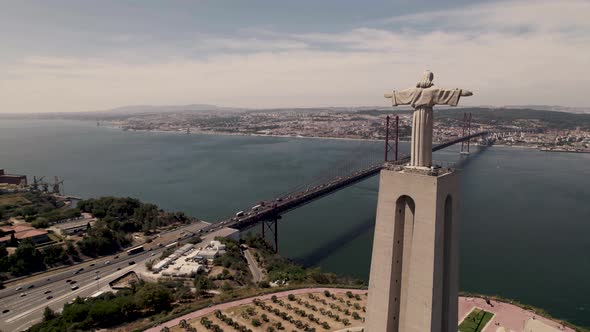 Drone flying pass holy sanctuary of Christ the King reveals beautiful Tagus river alt