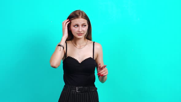 Close Up Pretty Charming Redhead Woman Shyly Looking in Camera Over Colorful Background alt
