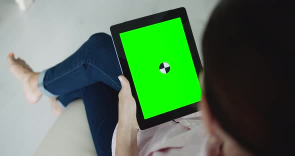 Woman Holding Tablet Chromakey Indoors