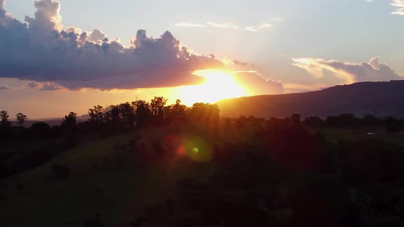 Sunset at farming landscape at countryside rural scenery. alt