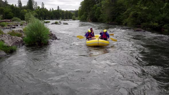 Aerial shot of people white water rafting on Rouge River, Oregon