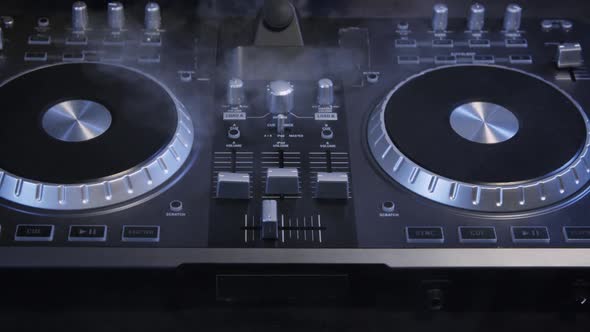 DJ Mixer And Spinning Turntable 35