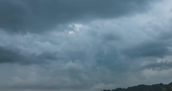 Time Lapse of Rain Clouds Over Beach and Sea Landscape with Boats alt