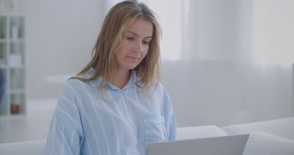 Exhausted Young Woman Taking Off Glasses Massaging Dry Irritable Eyes. Tired Overworked Lady Feeling alt