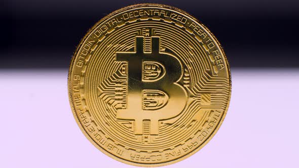 Golden Bitcoin on White Background alt