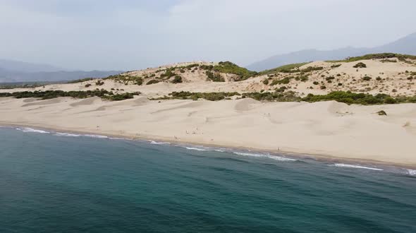 Desert dunes and the sea