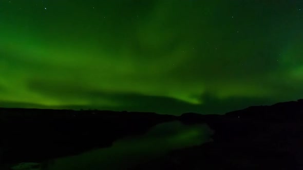 Aurora Borealis Time Lapse with Water Reflections