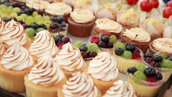 Cakes are Lying on the Counter in the Street Confectionery alt