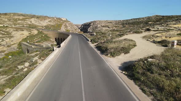 Aerial View of Road Across the Island Mountains alt