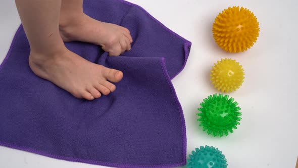 Prevention of Children's Flat Feet and Hallux Valgus Exercises with Tissue and Massage Balls alt