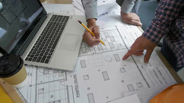 Architects Developing Blueprint alt