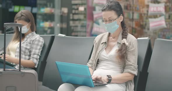 Surprised Mid-adult Woman in Face Mask Leaving for Departure with Baggage. Portrait of Caucasian alt