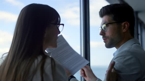 Closeup Man Throwing Papers Argue with Businesswoman alt