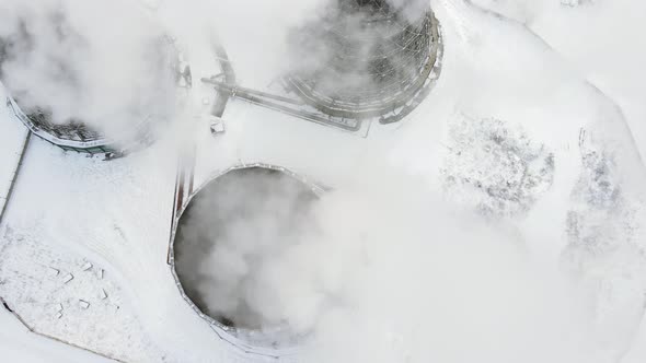 Aerial Photography Over Three Towers of a Thermal Power Plant alt
