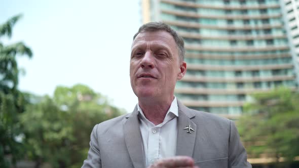 businessman in suit presenting a business data information work on video conference alt