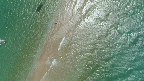 Aerial view of group kitesurfing in the Gulf of Patras, Greece. alt