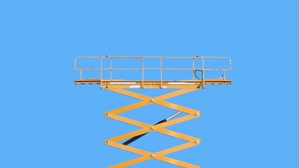Scissor Lift Or Cherry Picker Rising Then Lowering alt