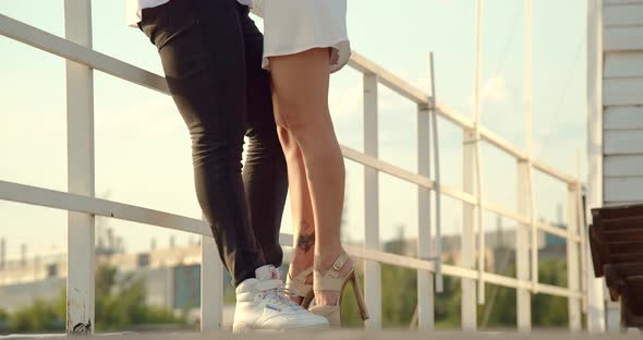 Couple Standing in Port in Summer