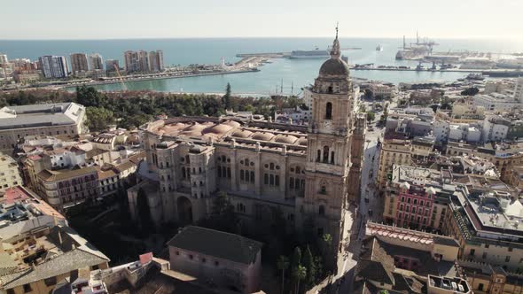 Aerial pan of Renaissance style Malaga Cathedral; Andalusia, Spain