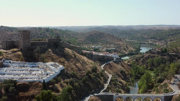 Medieval Castle Of Mertola With Guadiana River And Mountain Views During Summer In Portugal. - aeria alt