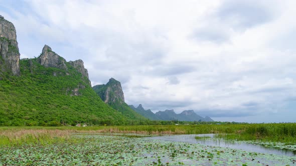 Lake with lotus at Sam Roi Yod National Park, Prachuap Khiri Khan, Thailand; zoom out - Time Lapse