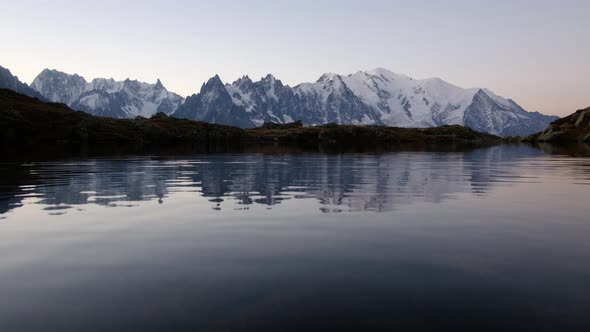 Colourful Sunrise on Chesery Lake in France Alps