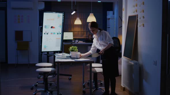 Businesswoman Enter in Company Office Meeting Room Late at Night Sitting at Desk Late at Night alt