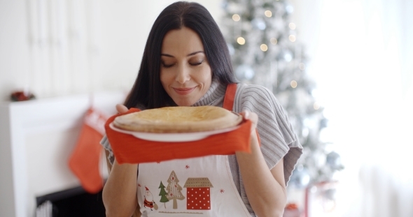 Attractive Young Woman Baking Tarts For Xmas alt