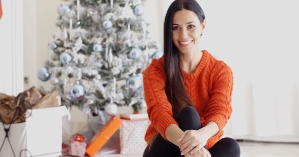 Young Woman Relaxing Over The Christmas Season alt