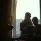 Children Sitting On The Windowsill - VideoHive Item for Sale