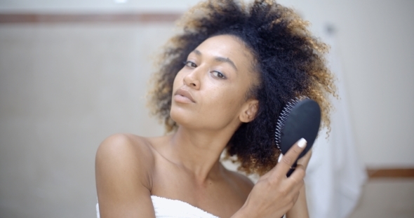 Woman Fixing Hair In The Morning, Stock Footage | VideoHive