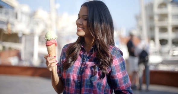 Young Girl Eating Ice Cream alt