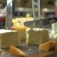 Hands Cutting Soft Cheese With Knife - VideoHive Item for Sale